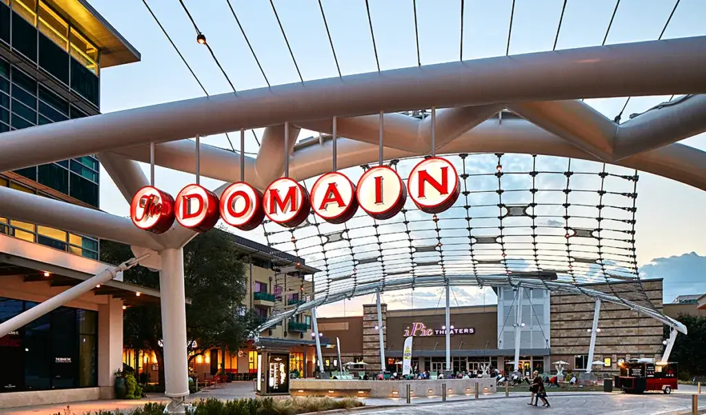 The Best Neighborhoods in Austin and Central Texas for Families Relocating for Work 4 A shopping area with a sign that says The Domain
